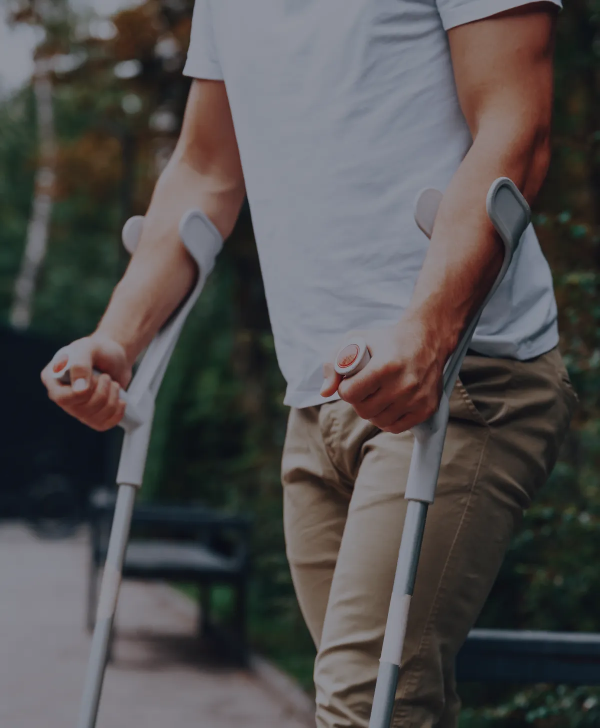 Insurance Investigations Man with crutches | Titan Investigations